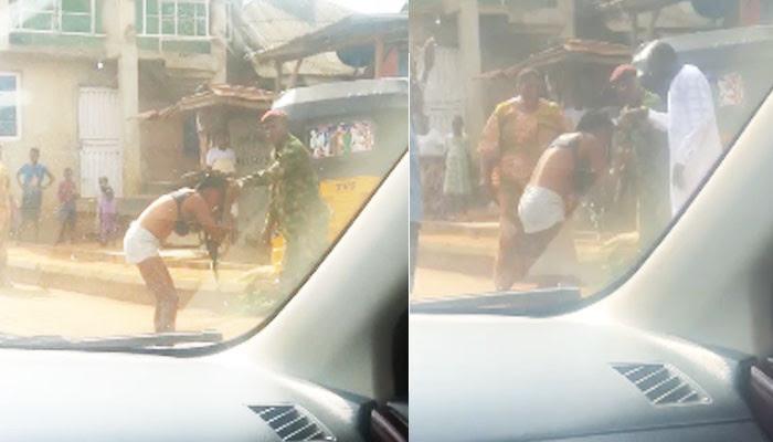 Soldier flogs, strips lady naked over 'indecent dressing' in Ogun (Video)