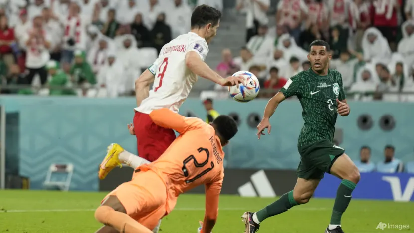 Robert Lewandowski scores first World Cup goal as Poland defeats Saudi Arabia