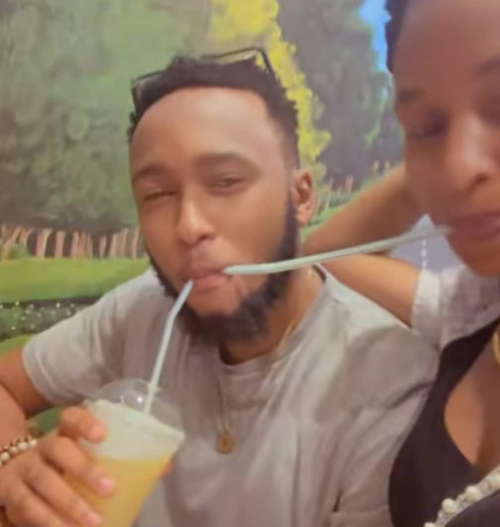 "Which stage is this?" - Nigerian couple's romantic straw-drinking style raises eyebrows on social media